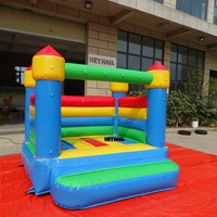 Château gonflable combiné avec toboggan et piscine à balles pour garçons et filles, idéal pour les fêtes d'anniversaire et la décoration d'événements