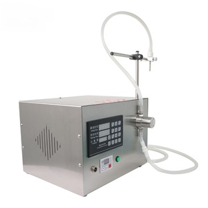 Machine de remplissage électrique de petite taille pour liquides spécifiques comme le miel et l'huile, facile à utiliser - Product Image 1