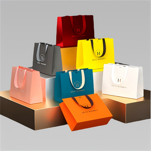 Bolsa de embalaje de compras de papel de arte reciclable de lujo personalizada de alta calidad con logotipo impreso para ropa zapatos al por mayor - Product Image 2