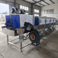 Machine à laver les caisses avec sécheuse intégrée et système de retournement automatique des paniers pour la production de pain et de produits alimentaires en boulangerie