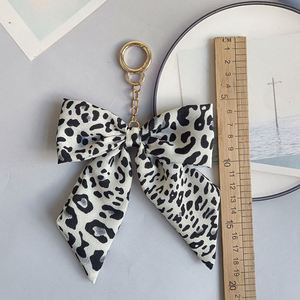 Autumn and Winter Leopard Print Bow Keychain Korean Style Fabric & Metal Ribbon Bag Pendant Creative <b>Car</b> - Product Image 3