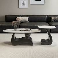 Ensemble de table basse design moderne, plateau ovale en pierre frittée avec base métallique incurvée unique
