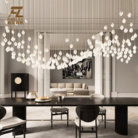 Lustre personnalisé Firelux pour villa, hôtel, escalier, grand modèle en céramique blanche, motif magnolia, branche et feuille de luxe
