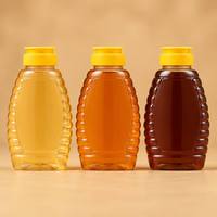 Bouteille en plastique PET transparente vide personnalisée en gros avec bouchon à clapet pour miel, sirop, sauce, 500g pour Ketchup