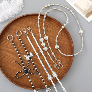 Perle noeud papillon sangle Anti-perte fronde sac à clip universel pour coque de téléphone lanière de téléphone perlée à la main longue bandoulière <span class=keywords><strong>collier</strong></span> chaîne - Product Image 1