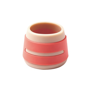 Coussinets de protection antidérapants en silicone rouge et blanc pour pieds de table et de chaise - Product Image 1
