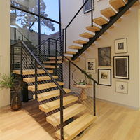 Escalier flottant préfabriqué sur mesure à poutre simple avec balustrade à câbles métalliques