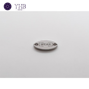 ปุ่มเย็บโลหะป้ายโลโก้อุปกรณ์เสริมสำหรับเสื้อผ้ามี2รูทรงวงรี - Product Image 5