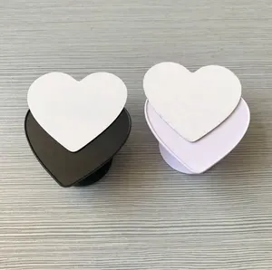 Venta al por mayor de soporte de teléfono móvil en blanco de sublimación con bolsa OPP, enchufes de teléfono de sublimación en blanco círculo en forma de corazón 2D soporte DIY - Product Image 1