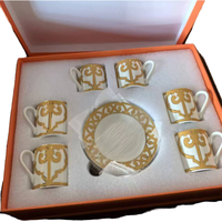 Desain Eropa 12 buah Set teh porselen ramah lingkungan dengan lukisan bunga keramik untuk penggunaan rumah kopi termasuk pegangan logam