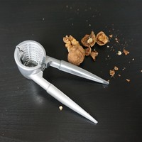 Outil multifonctionnel en métal pour éplucher les noix, ouvre-boîte, pince et pince à noisettes pour usage domestique
