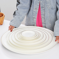 Assiettes plates rondes en porcelaine fine dorée de luxe pour salade, steak, dessert, collations et pâtes