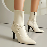 Bottes mi-mollet extensibles vert néon à bout pointu, style punk chic pour le printemps et l'été, idéales pour les loisirs et les voyages.