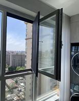 Ventanas de Aluminio Negras Personalizadas con Aislamiento Térmico, Triple Acristalamiento y Rejilla