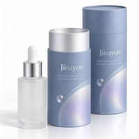 Emballage de tube en papier pour sérum de soin personnalisé avec noyau en carton blanc, impression CMYK, pelliculage et vernis UV brillant