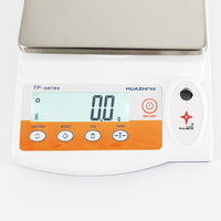 Balance de précision scolaire HUAZHI TP-B6000 6000g/0.1g certifiée CE avec écran LCD, capteur de pesée et matériau ABS, garantie 1 an
