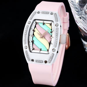 Montre en céramique en forme de baril avec lunette sertie de diamants, cadran macaron, verre saphir et bracelet en caoutchouc blanc pour une élégance quotidienne - Product Image 2
