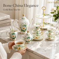 Service à thé en porcelaine fine Camélia Blanc avec bordure dorée, style Moyen-Orient, portable, comprenant théière, tasses, soucoupes, sucrier, crémier, support à gâteau, cuillère et coffret cadeau