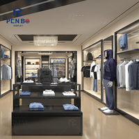 Présentoir de vêtements en métal noir personnalisé avec logo pour magasin de vêtements pour hommes, support de présentation de costumes, présentoir de vêtements de détail