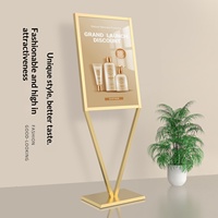 Support de présentation publicitaire vertical sur pied en métal pour affiches de centre commercial - Doré