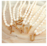 Tendance bijoux 2025 nouveautés étanche en acier inoxydable perles de riz lettre breloque collier de perles pour les femmes