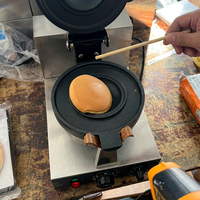 Gaufrier électrique professionnel en forme d'OVNI avec contrôle de température rotatif pour café et snack-bar