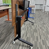 Table pliante à plateau rabattable en promotion, bureau mobile peu encombrant et empilable avec roulettes pour usage en bureau ou salle de formation