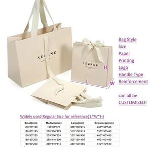 Ensemble de sacs <span class=keywords><strong>en</strong></span> <span class=keywords><strong>papier</strong></span> beige de luxe (3 pièces) avec nœud |   Logo de marque imprimé sur mesure pour l'emballage de produits et de cadeaux - Product Image 2