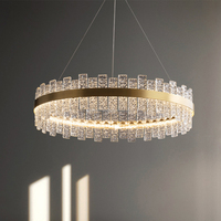 Lampe suspendue créative LED moderne en verre éclairage décoratif anneau circulaire corps en laiton doré lampe suspendue en cristal lustre d'hôtel