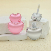 Mini glaçage pour les lèvres de 5ml personnalisé en usine Tube de glaçage pour les lèvres en forme de cœur Conteneur de tube de brillant à lèvres de couleur et de logo personnalisés Bouteille vide cosmétique