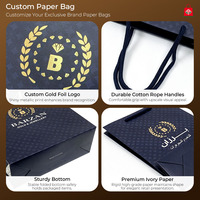 Sac en papier de luxe pour bijoux, sac de shopping personnalisé avec logo estampé à chaud en or et poignée en corde de coton pour l'emballage de bijoux
