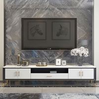 Meuble TV en marbre blanc de style européen moderne et simple pour salon, avec quatre pieds de table en métal noir et blanc