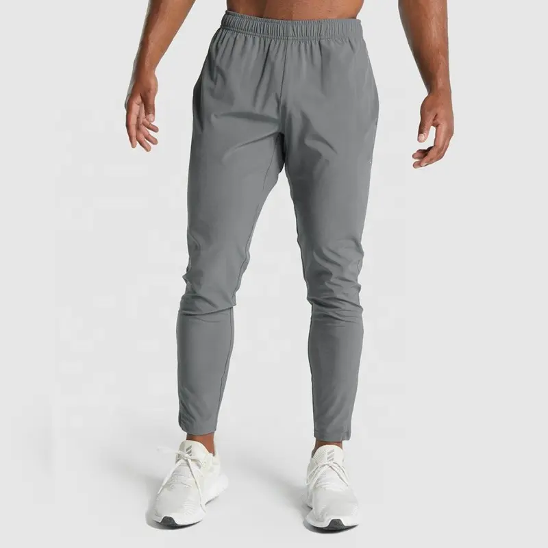 Calça de náilon personalizada, calça de tecido slim fit para homens para treino em academia