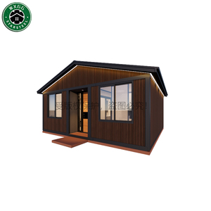 Casa prefabricada de acero ligero con revestimiento de ranuras verticales, cabina modular con techo a dos aguas para habitación de huéspedes de resort. - Product Image 1