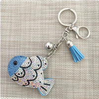 Porte-clés de haute qualité, best-seller, orné de strass scintillants multicolores en forme de lune et d'œil protecteur, avec pompons