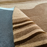 Tapis rond moderne minimaliste en laine de Nouvelle-Zélande à boucles rayées fabriqué à la machine Manna pour salon et chambre à coucher