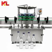 Ligne de production d'eau en bouteille à 12 têtes, type split, machine de lavage, remplissage et scellage de bouteilles PET pour usine d'eau à petite échelle