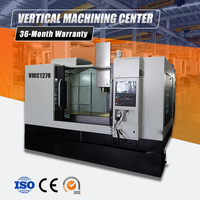 Centre d'usinage vertical CNC VMC1270 à 3 axes avec guides linéaires robustes pour la production de composants automobiles