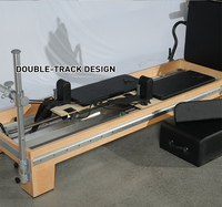 Reformer de Pilates professionnel en bois d'érable équilibré, couleur et logo personnalisables, équipement robuste pour l'entraînement au Pilates