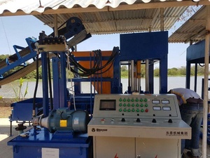 Máquina de fabricación de ladrillos de la industria de bloques huecos de cemento automática personalizada de alta calidad de la Qt4-15 - Product Image 5