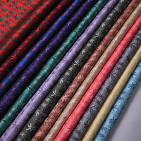 Yili nouveau tissu Jacquard de palmier de style tropical avec motif de grille de veine de feuille de plante fine adapté aux vêtements et aux textiles de maison