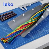Tubo protector de cables de PVC gris flexible ignífugo de 220 V con cierre de botón para cableado dividido
