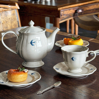 Service de table en céramique peint à la main, motif hirondelle en relief sous glaçure, design moderne et simple, comprenant bol, assiette, bouilloire, tasse à café haut de gamme