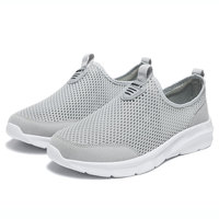 Vente en gros de chaussures de sport de mode pour hommes de grande taille semelle EVA légère à tige en maille respirante pour chaussures de marche de printemps et d'été