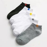 Chaussettes de sport absorbant la sueur respirantes de couleur unie à prix bon marché Chaussettes de bateau noires blanches et grises