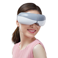 Masque pour les yeux chauffant avec compresse chaude numérique intelligente électrique sans fil pliable pression d'air vibration masseur avec musique
