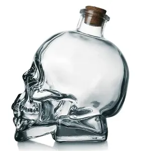 Creative transparent vodka spirits 750ml skull whiskey liquor bottle vodka glass bottle with cork