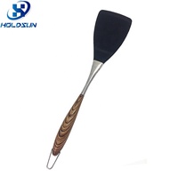 Spatule à fentes en silicone résistante à la chaleur de style moderne avec manche en acier inoxydable durable et revêtement en bois pour la cuisine domestique