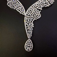 Ensemble collier et boucles d'oreilles en cuivre plaqué platine avec zircon, motif ailes d'ange, plumes, cadeau de mariage, bijoux de fête, style banquet haut de gamme