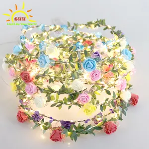 Ghirlanda di fiori in plastica illuminata a caldo per festosa
